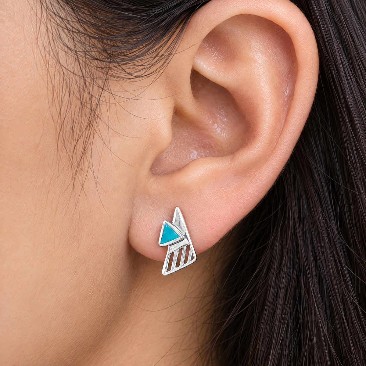 Teal Triangle Enamel Stud Earrings in 925 sterling silver, worn on the ear