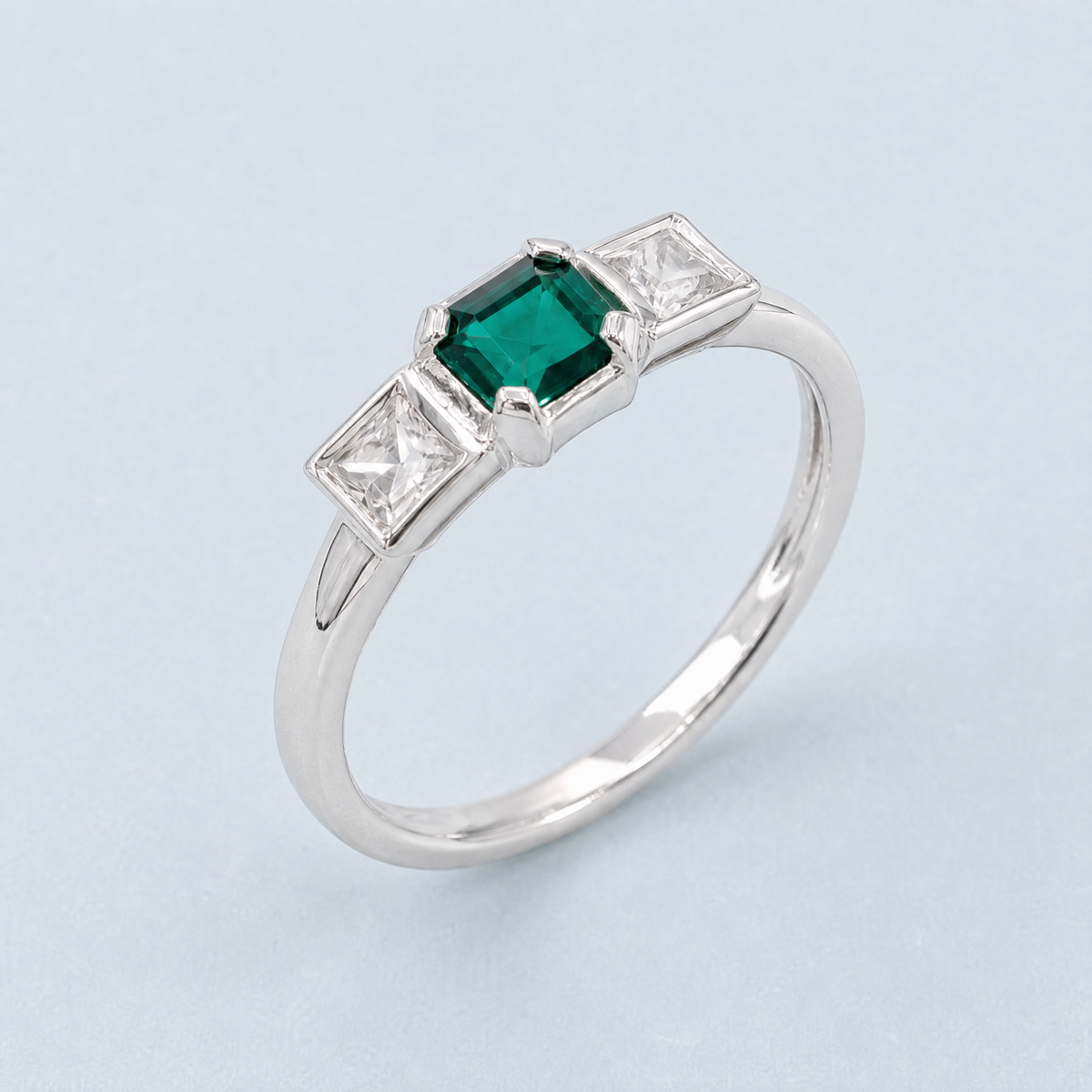 Green and Clear Trio Ring in 925 sterling silver, angled view
