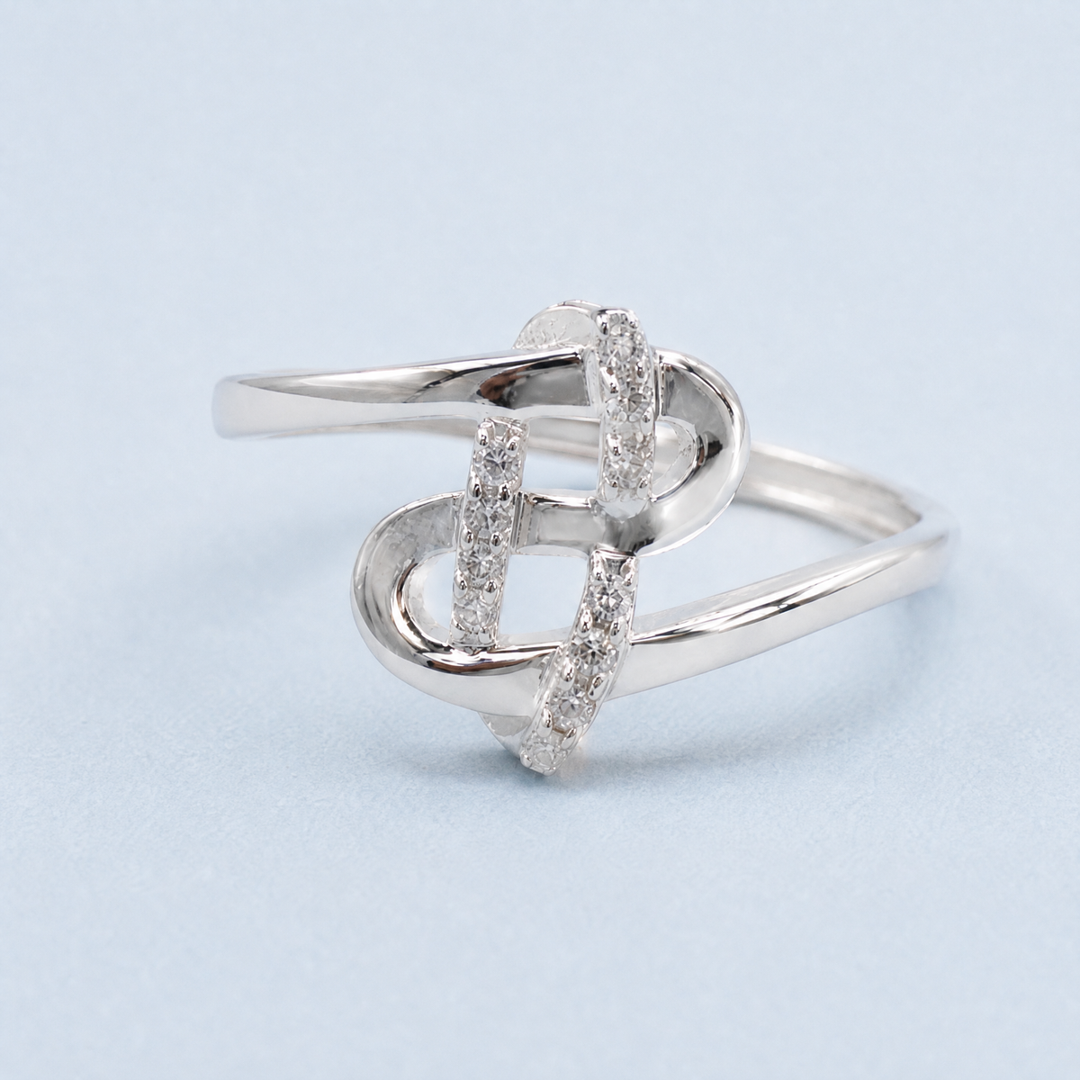 Pavé Knot Bypass Ring in 925 sterling silver, angled view