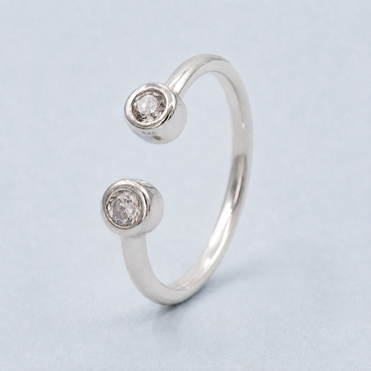 Twin Stone Open Ring in 925 sterling silver, angled view