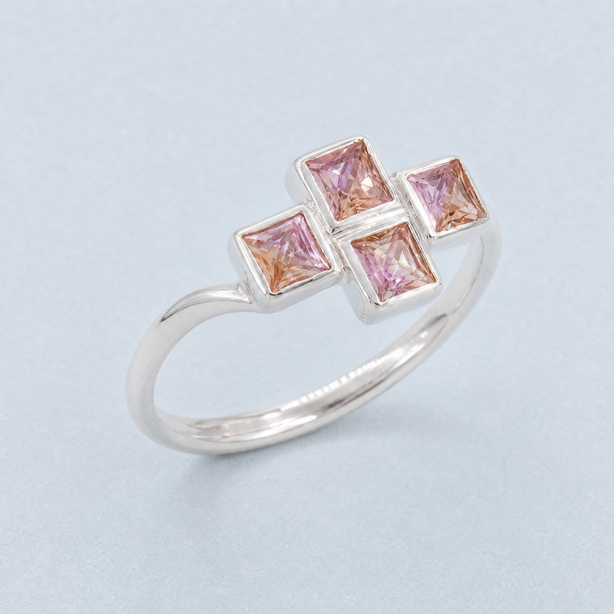 Curved Band Four Stone Ring in 925 sterling silver, angled view