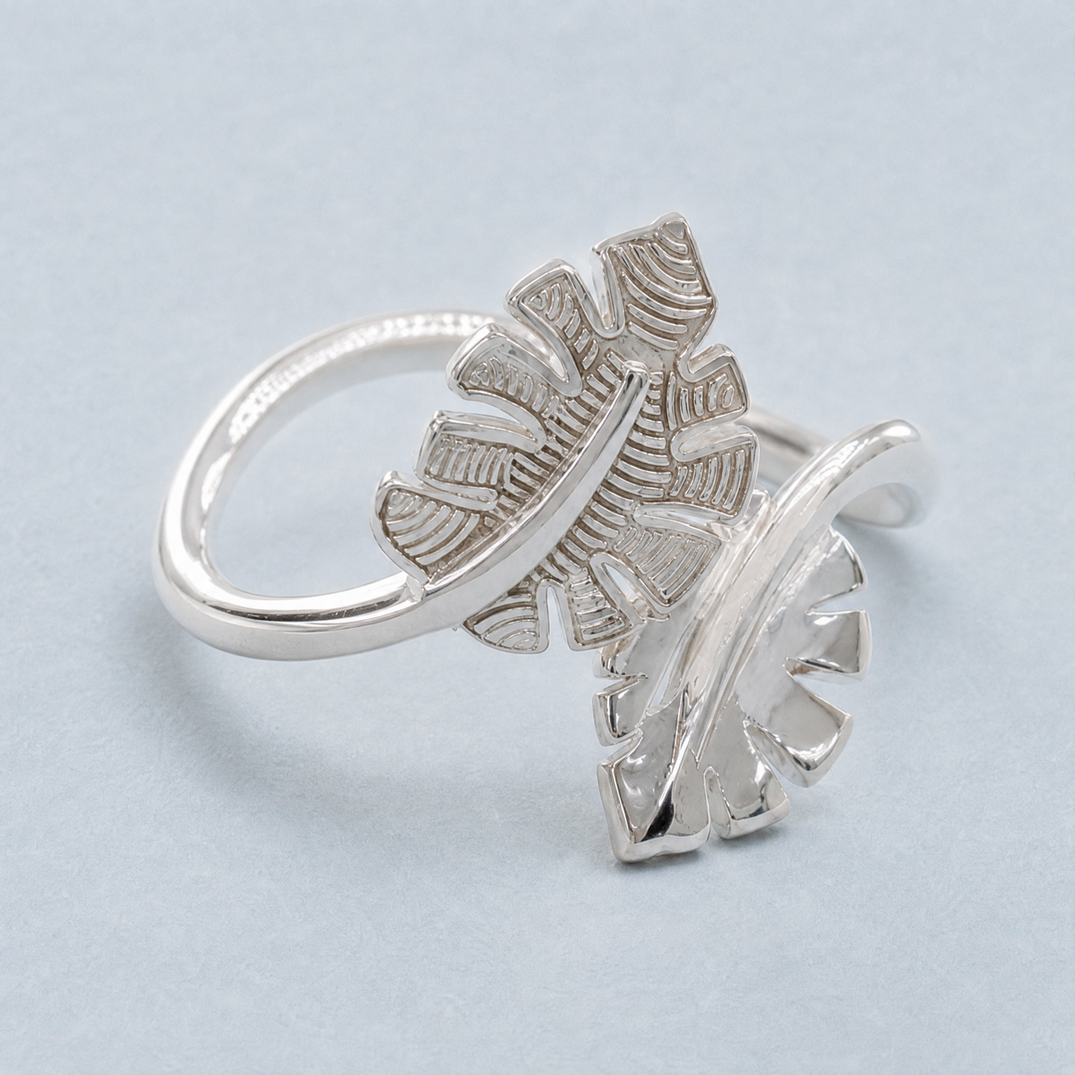 Twin Leaf Bypass Ring in 925 sterling silver, angled view
