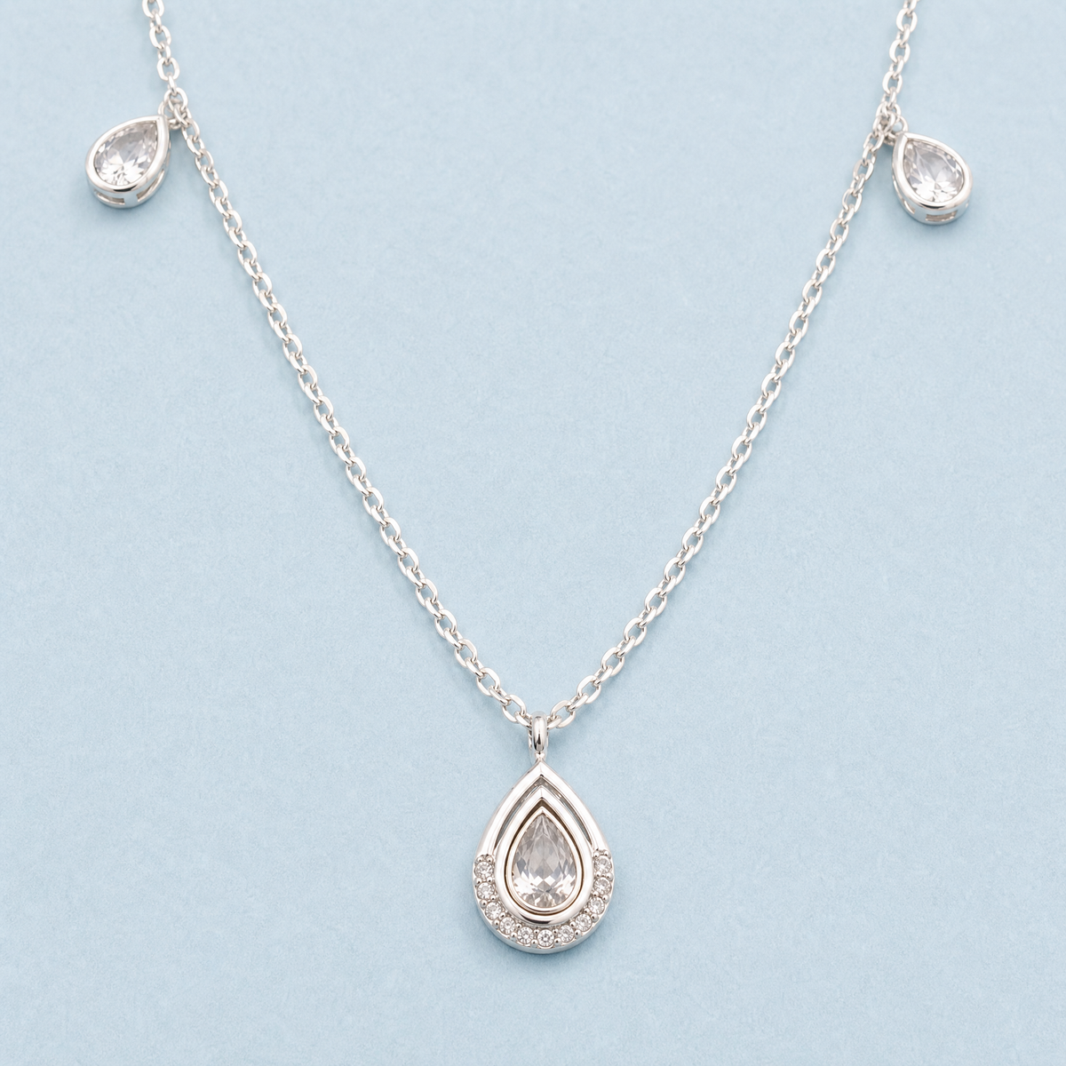Pear Halo Station Necklace in 925 sterling silver, front view
