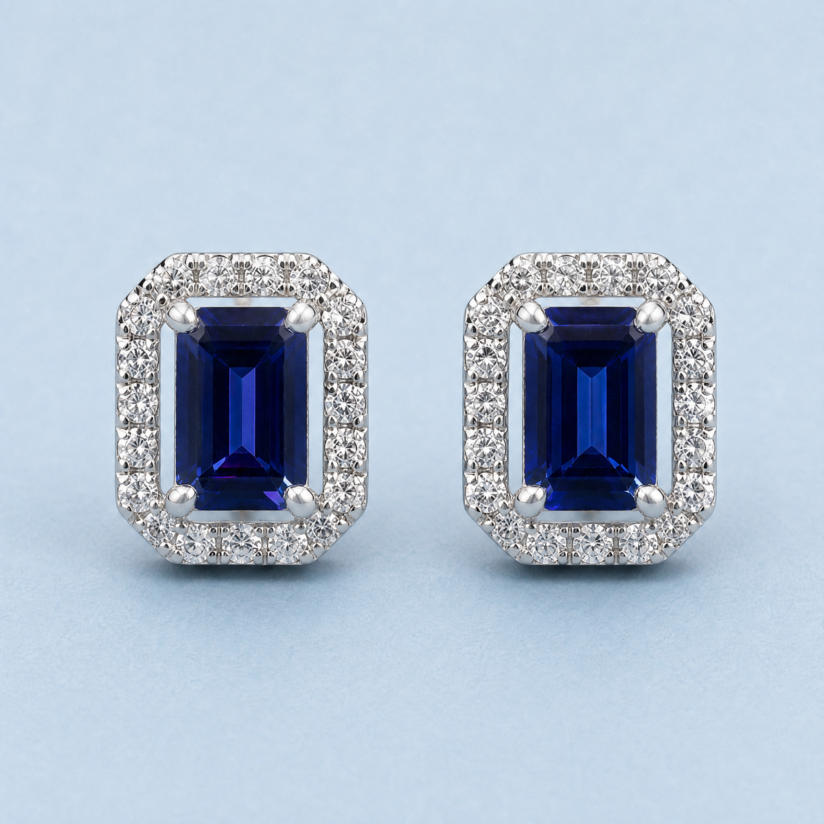 Blue Step Cut Halo Stud Earrings in 925 sterling silver, front view