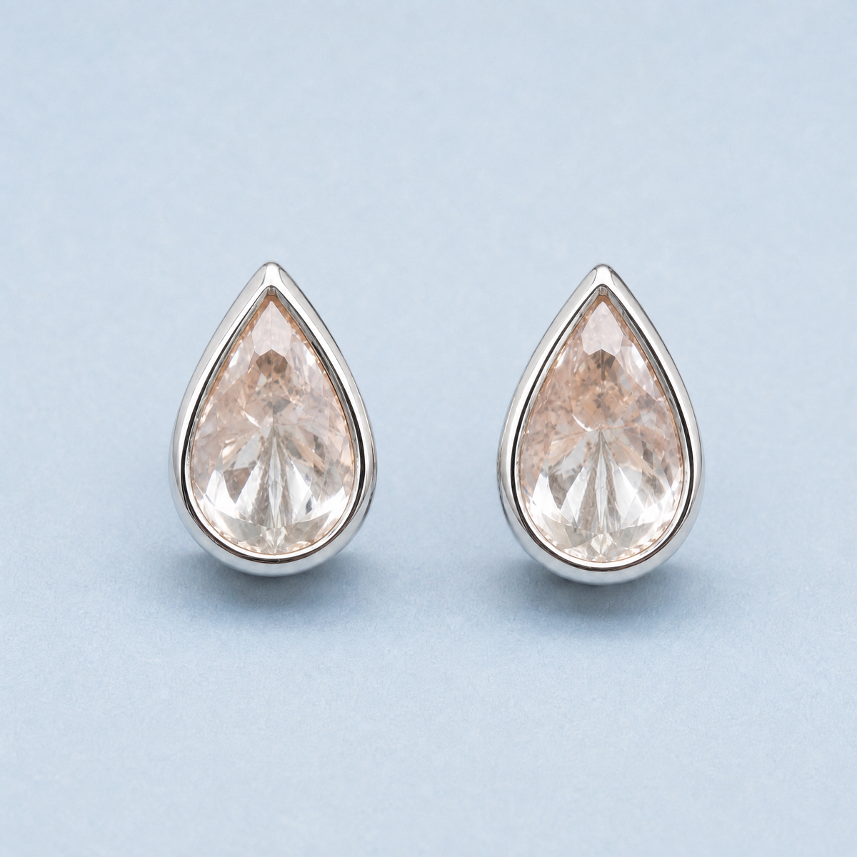 Blush Pear Bezel Stud Earrings in 925 sterling silver, front view