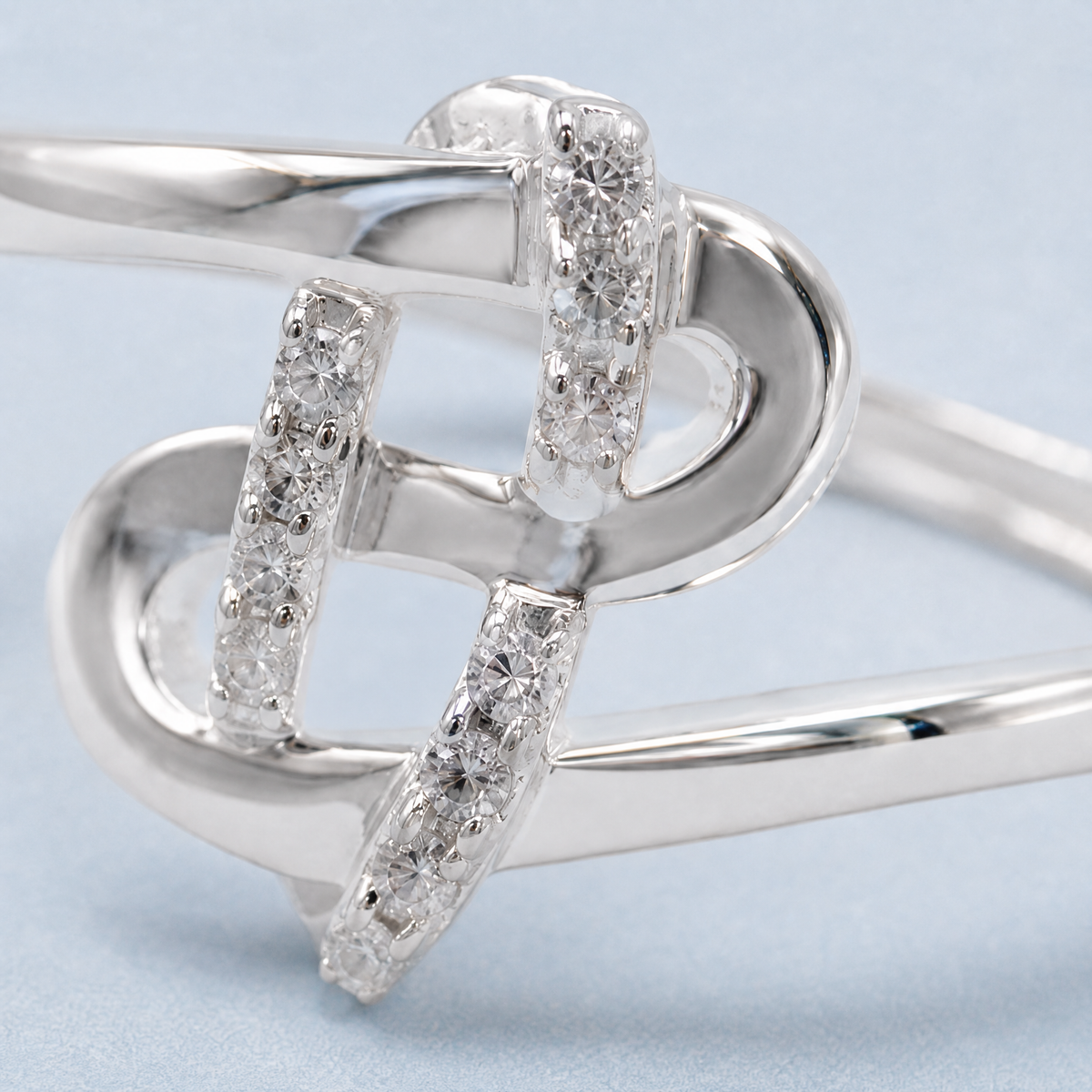 Pavé Knot Bypass Ring in 925 sterling silver, close-up of the stone