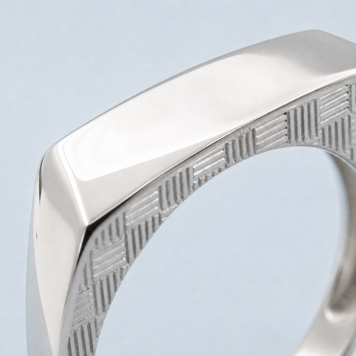 Square Top Woven Band Ring in 925 sterling silver, close-up of the engraving