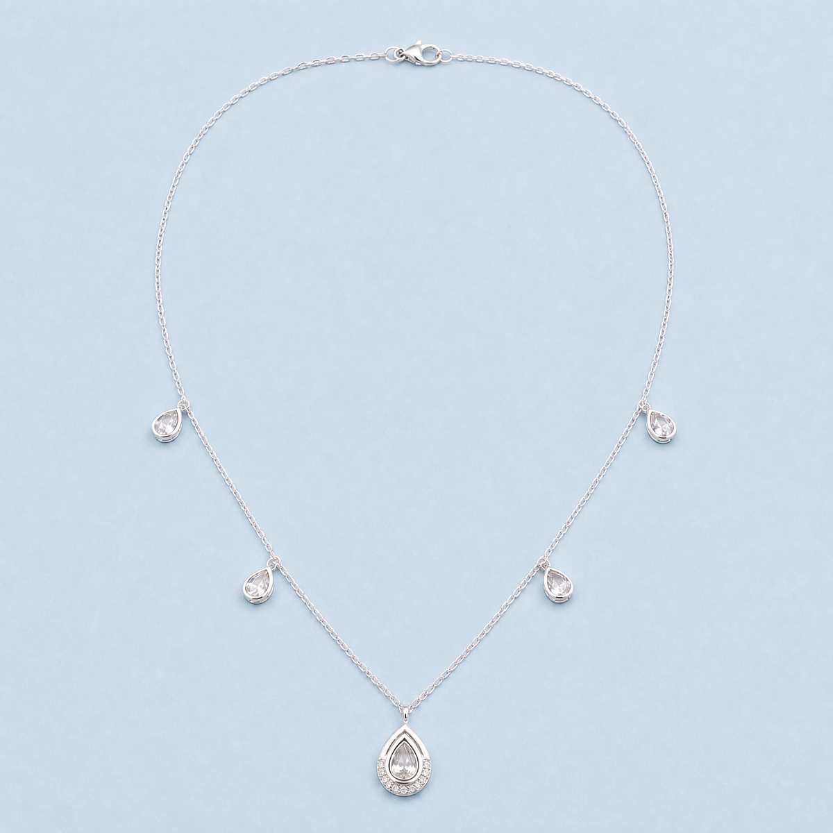 Pear Halo Station Necklace in 925 sterling silver, full necklace laid flat