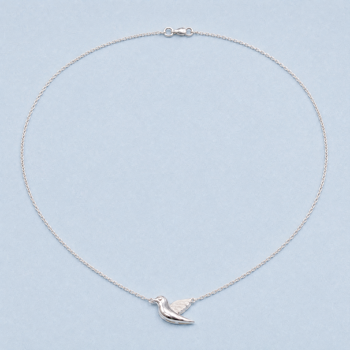 Songbird Pendant Necklace in 925 sterling silver, full necklace laid flat
