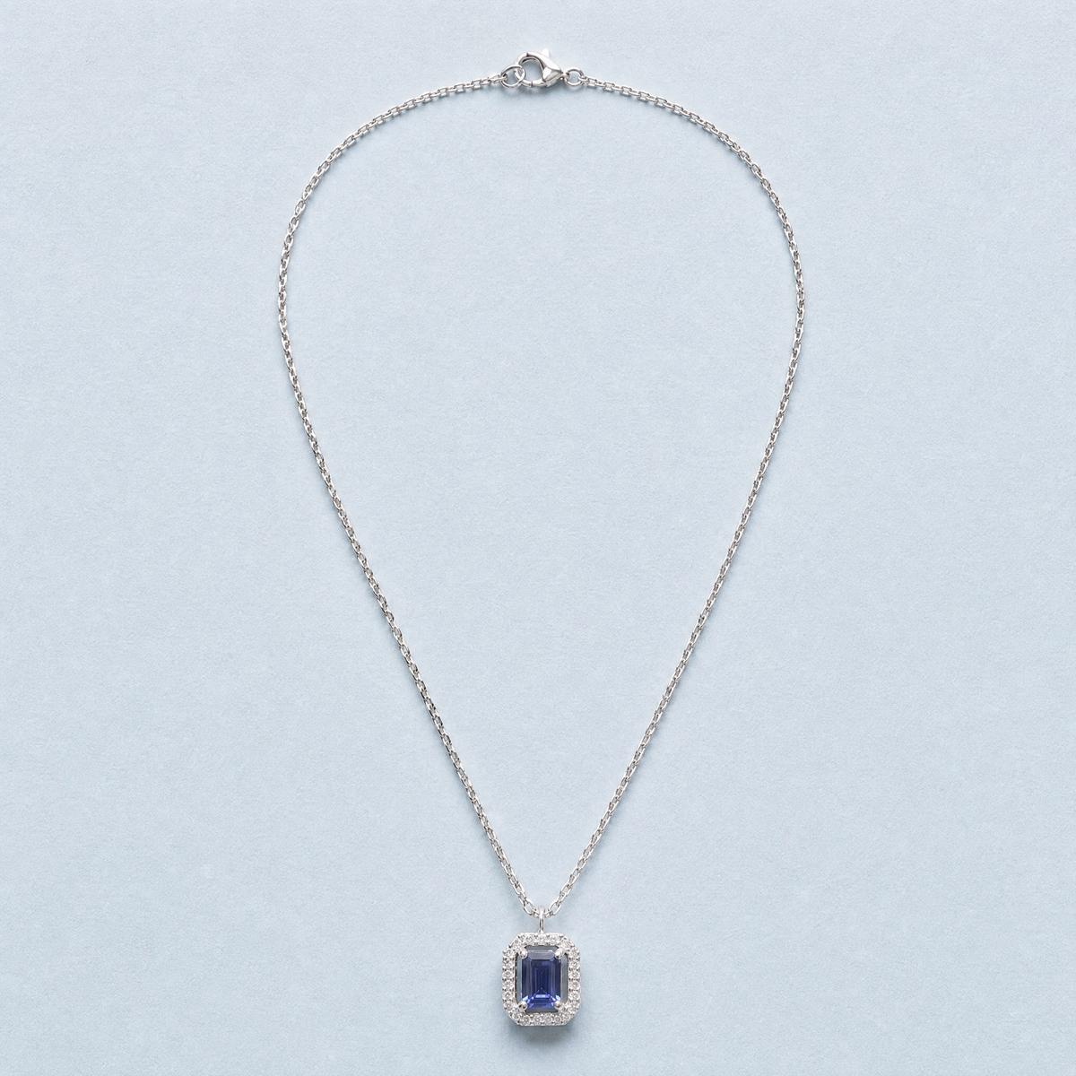 Blue Halo Pendant Necklace in 925 sterling silver, full necklace laid flat