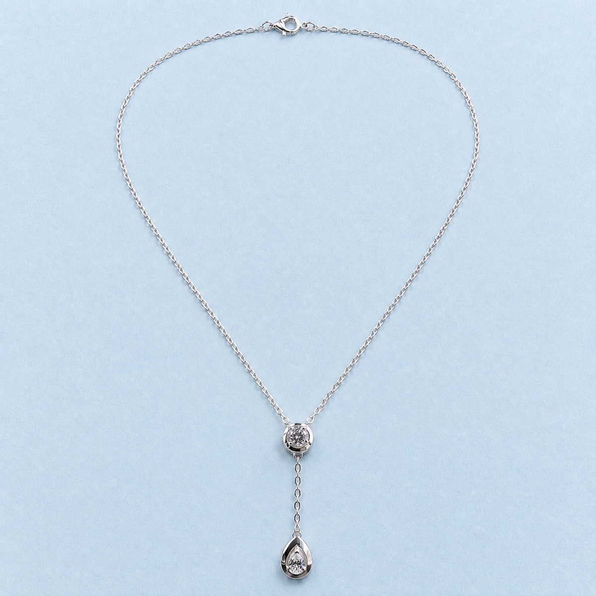 Clear Drop Y Necklace in 925 sterling silver, full necklace laid flat