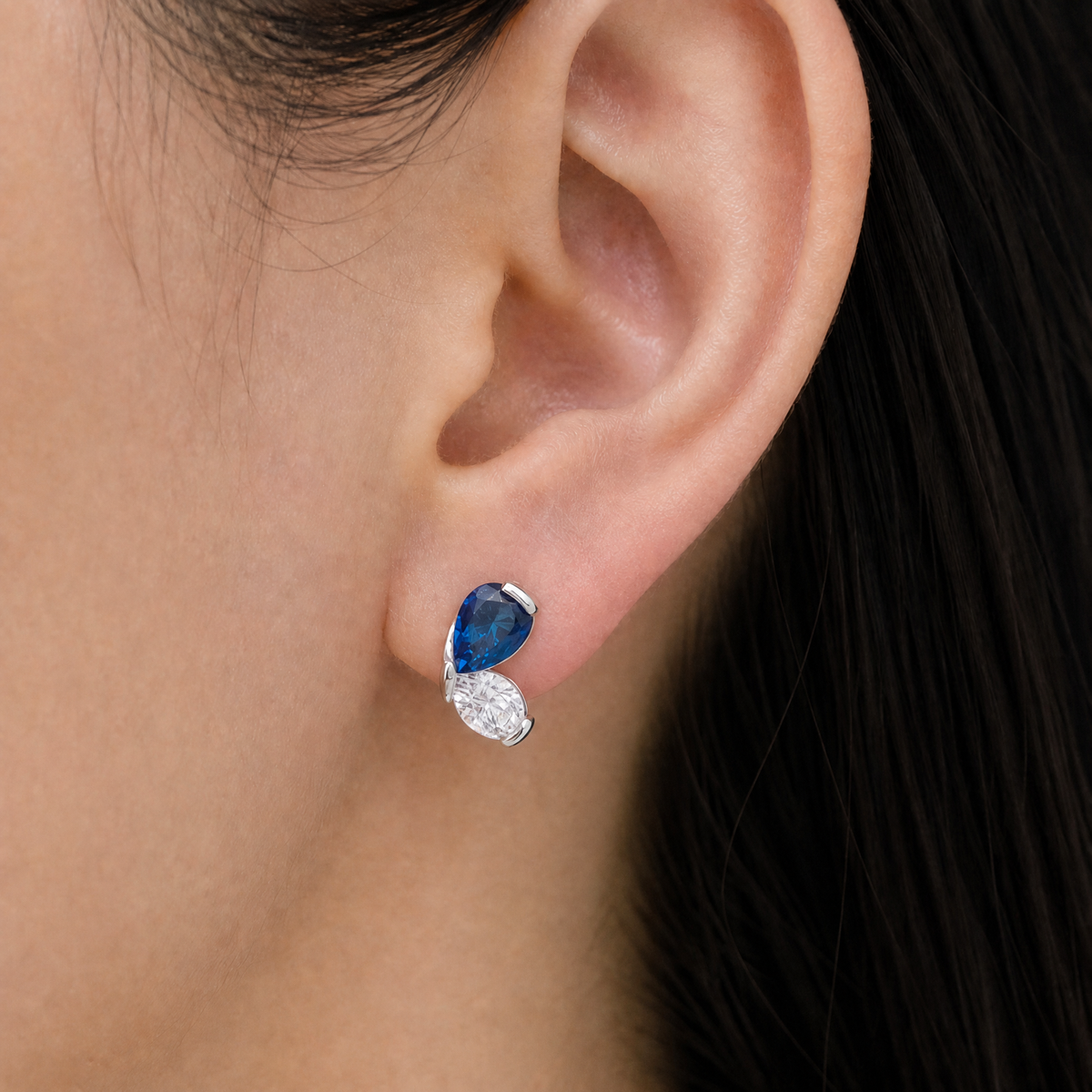 Blue Wing Butterfly Stud Earrings in 925 sterling silver, worn on the ear