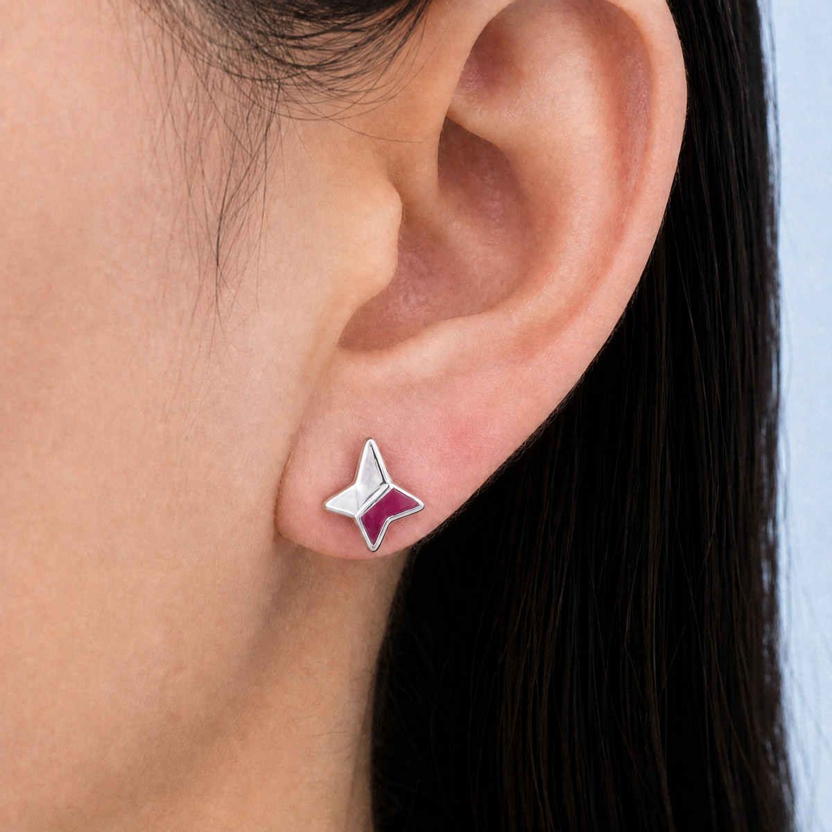 Four Point Star Enamel Stud Earrings in 925 sterling silver, worn on the ear