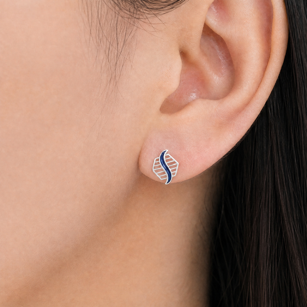 Blue Wave Enamel Stud Earrings in 925 sterling silver, worn on the ear