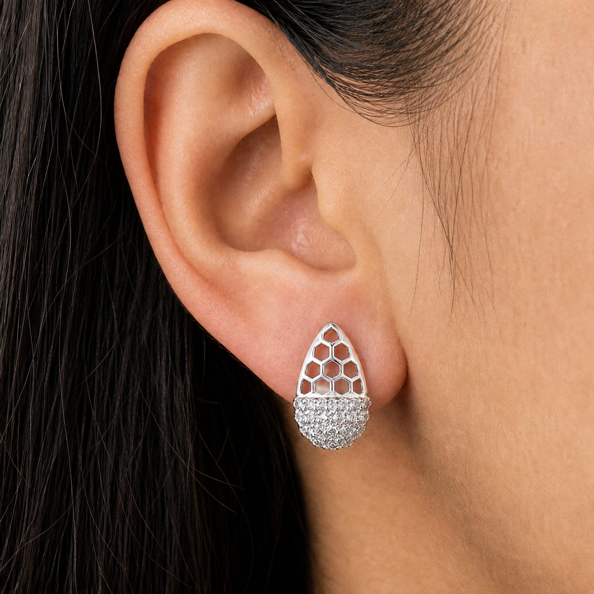Honeycomb Pavé Stud Earrings in 925 sterling silver, worn on the ear