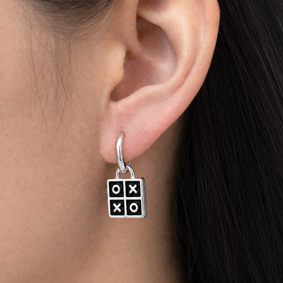 Tic Tac Toe Enamel Drop Earrings in 925 sterling silver, worn on the ear