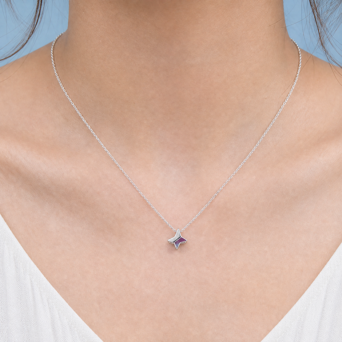 Four-Point Star Enamel Necklace in 925 sterling silver, worn at the neckline