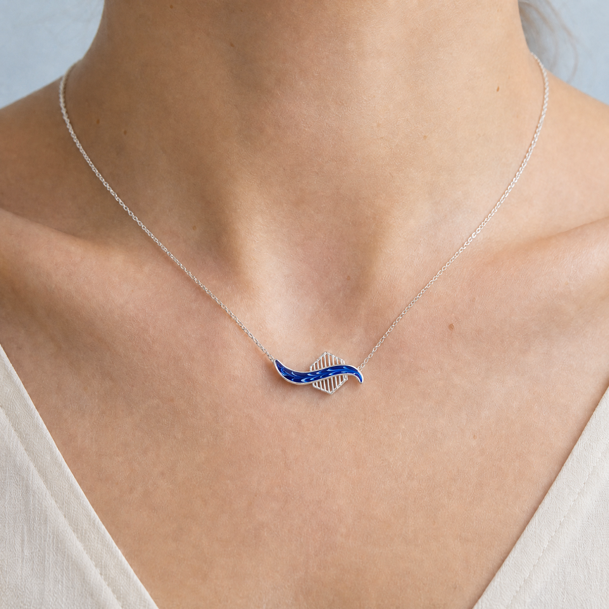 Blue Wave Enamel Necklace in 925 sterling silver, worn at the neckline