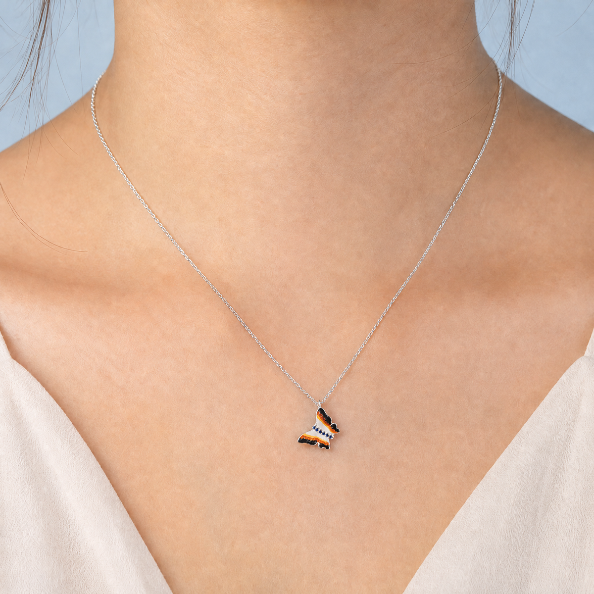 Monarch Butterfly Pendant Necklace in 925 sterling silver, worn at the neckline