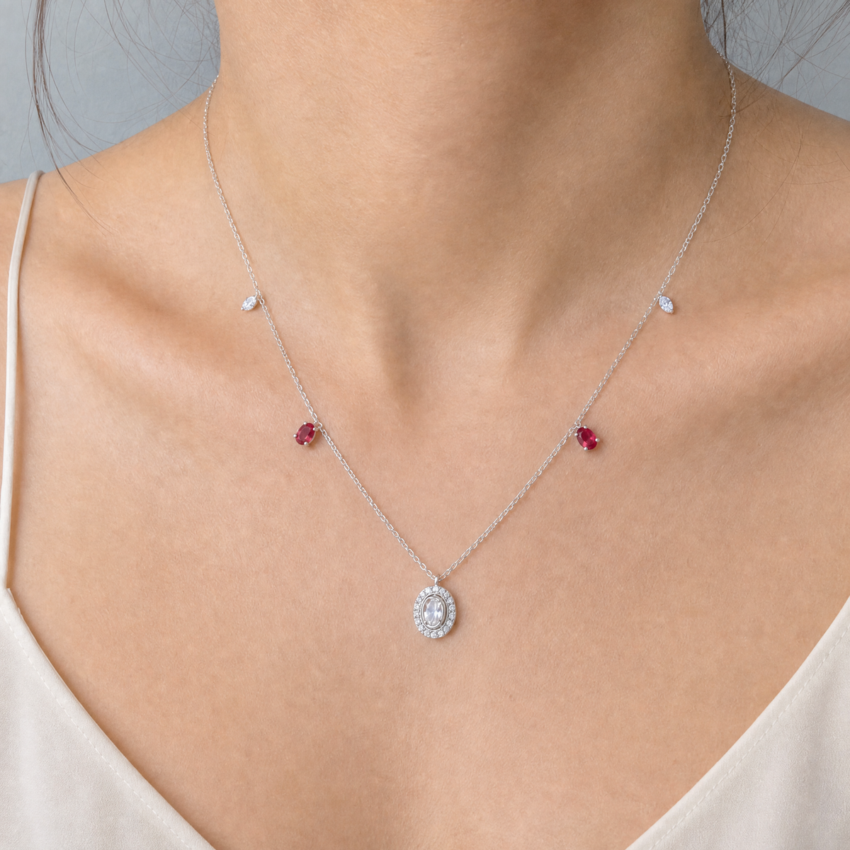 Oval Halo Station Necklace in 925 sterling silver, worn at the neckline