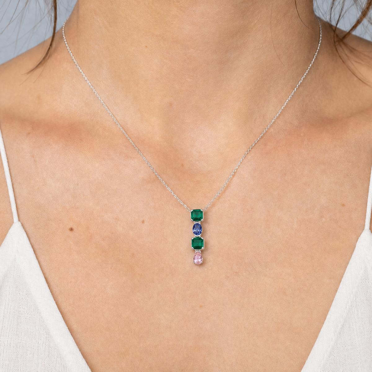 Four Stone Colour Drop Necklace in 925 sterling silver, worn at the neckline