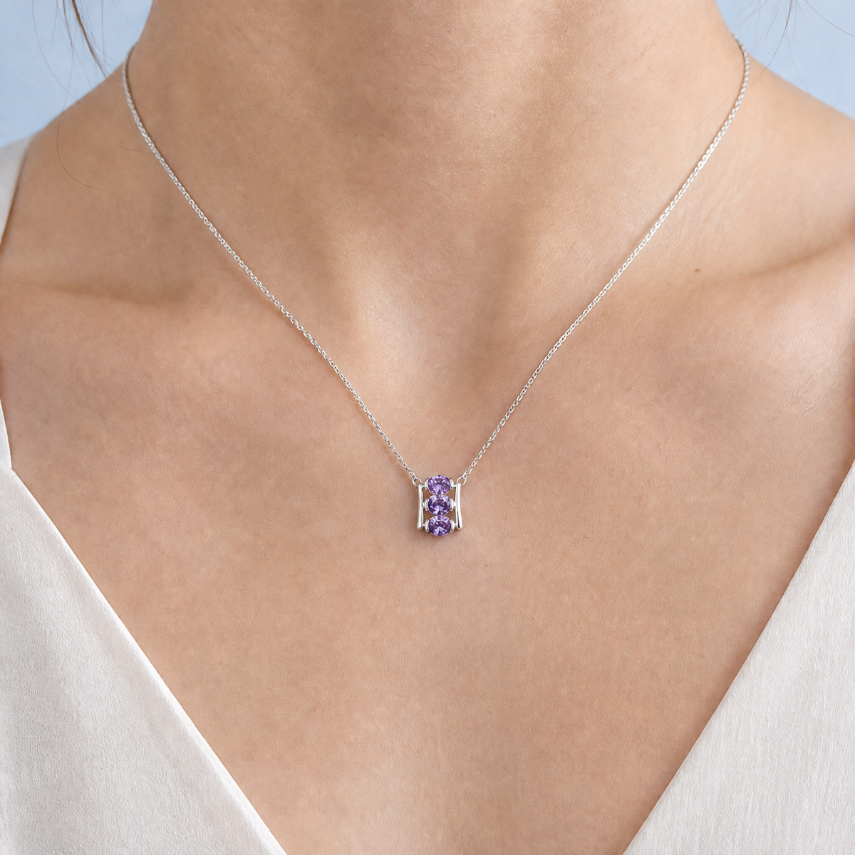 Purple Trio Ladder Necklace in 925 sterling silver, worn at the neckline