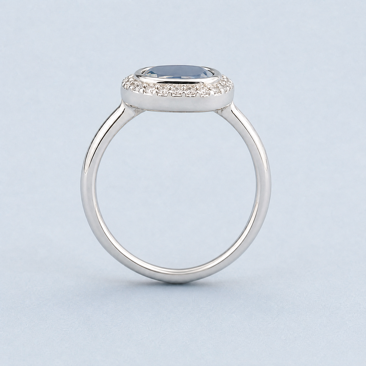 Blue Triangle Halo Ring in 925 sterling silver, upright view