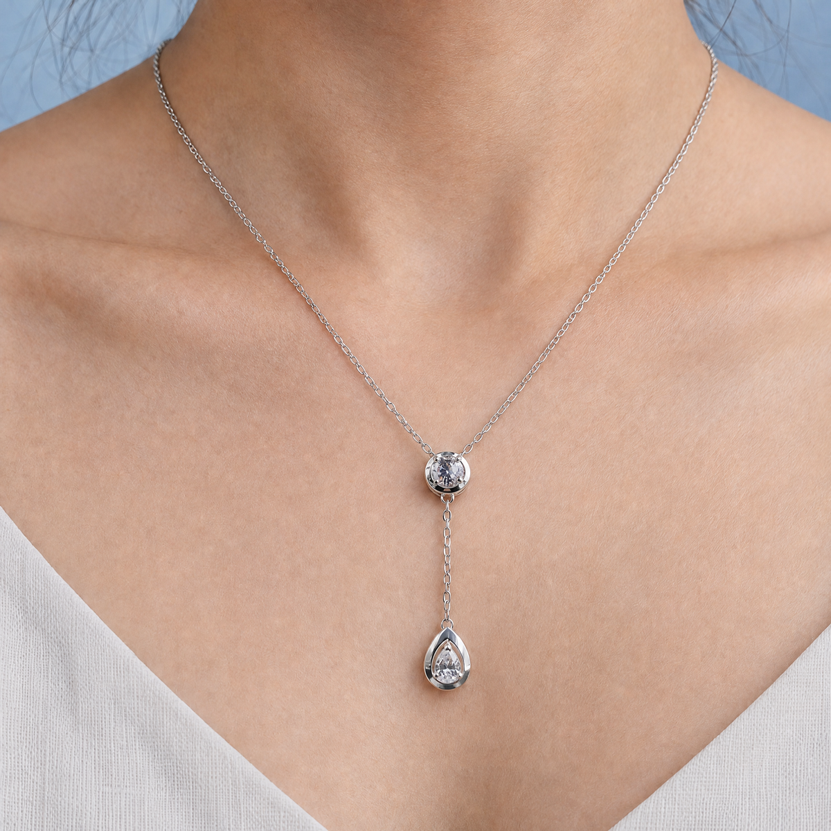 Clear Drop Y Necklace in 925 sterling silver, worn at the neckline