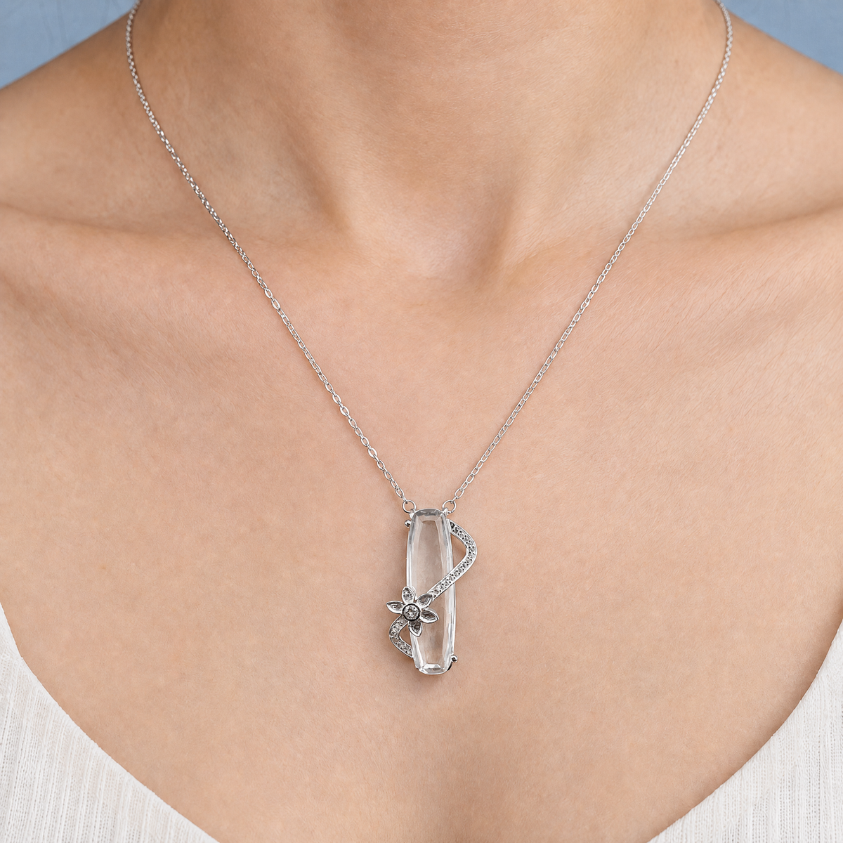 Flower Wrap Clear Stone Necklace in 925 sterling silver, worn at the neckline