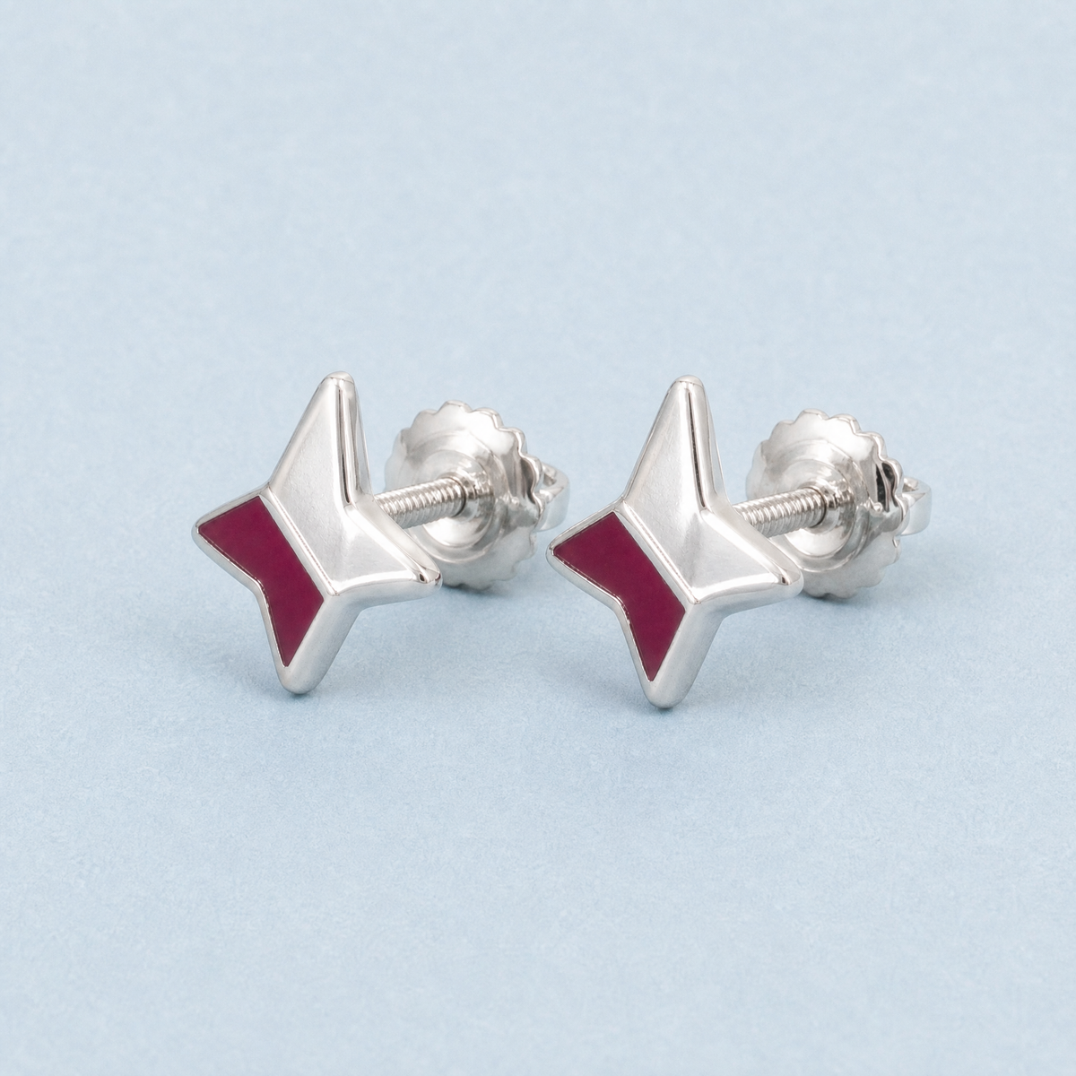Four Point Star Enamel Stud Earrings in 925 sterling silver, angled view
