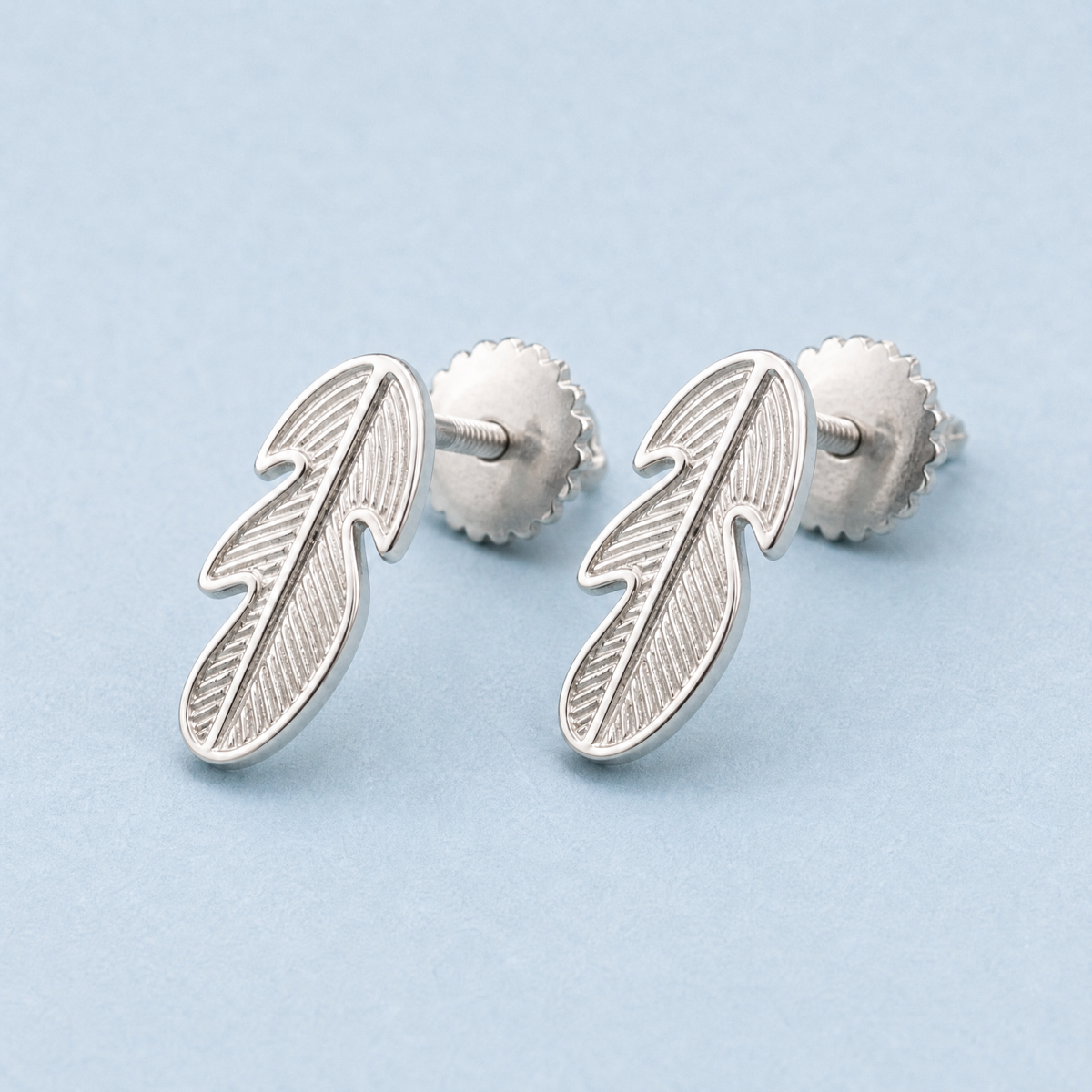 Engraved Feather Stud Earrings in 925 sterling silver, angled view