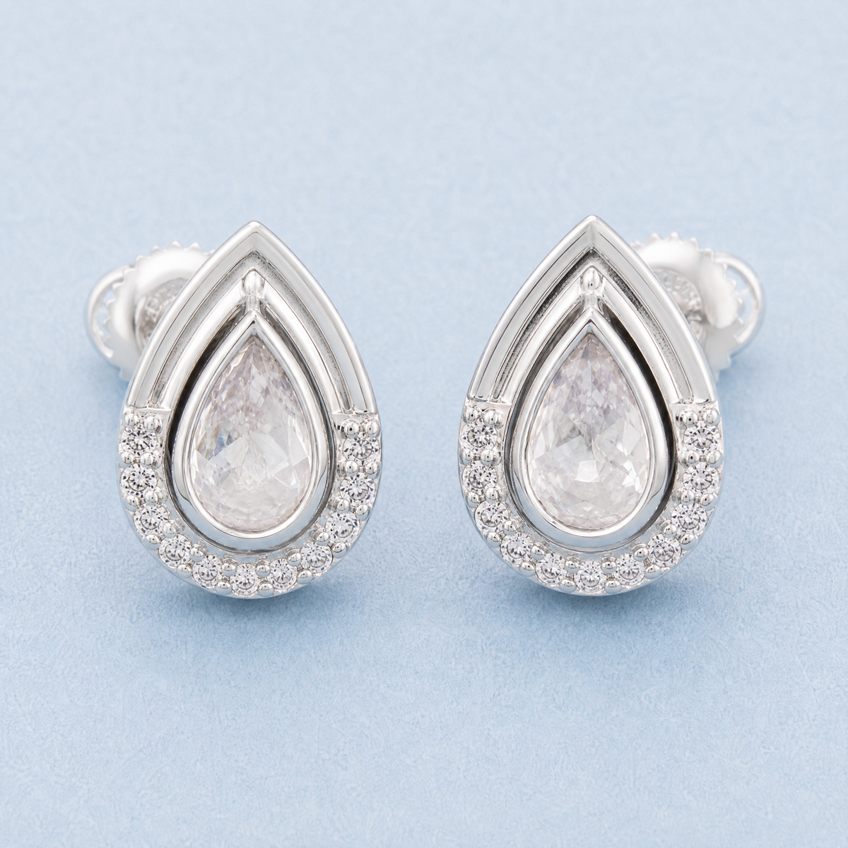 Pear Halo Frame Stud Earrings in 925 sterling silver, close front view