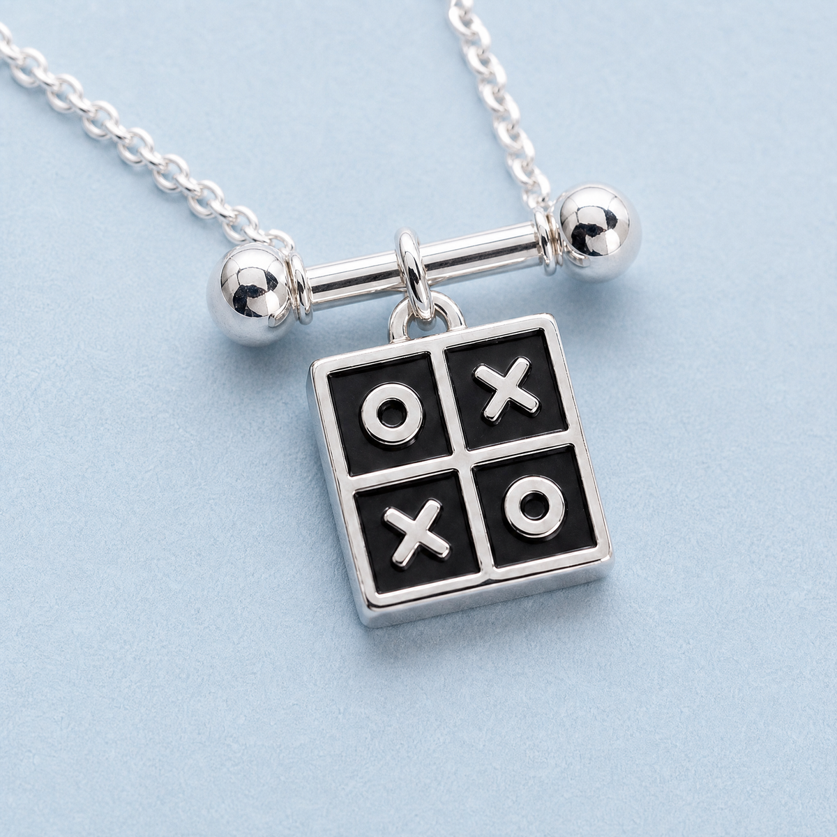 Tic Tac Toe Pendant Necklace in 925 sterling silver, close-up of the pendant