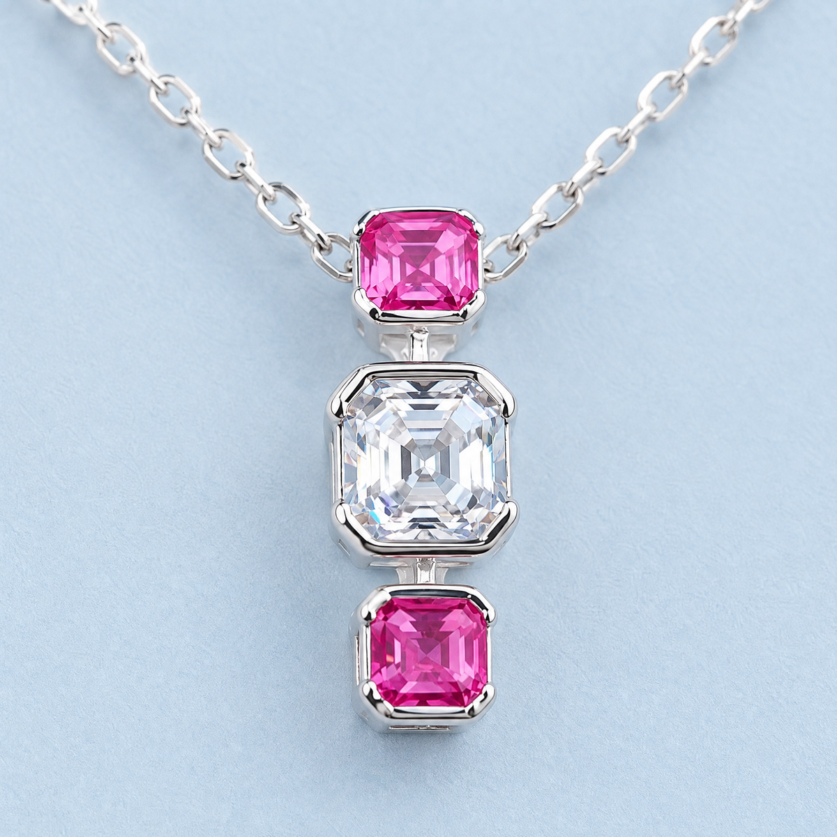Pink and Clear Trio Necklace in 925 sterling silver, close-up of the pendant
