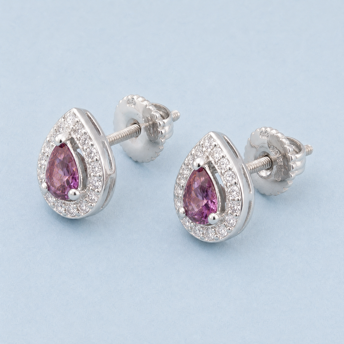 Purple Pear Halo Stud Earrings in 925 sterling silver, side view