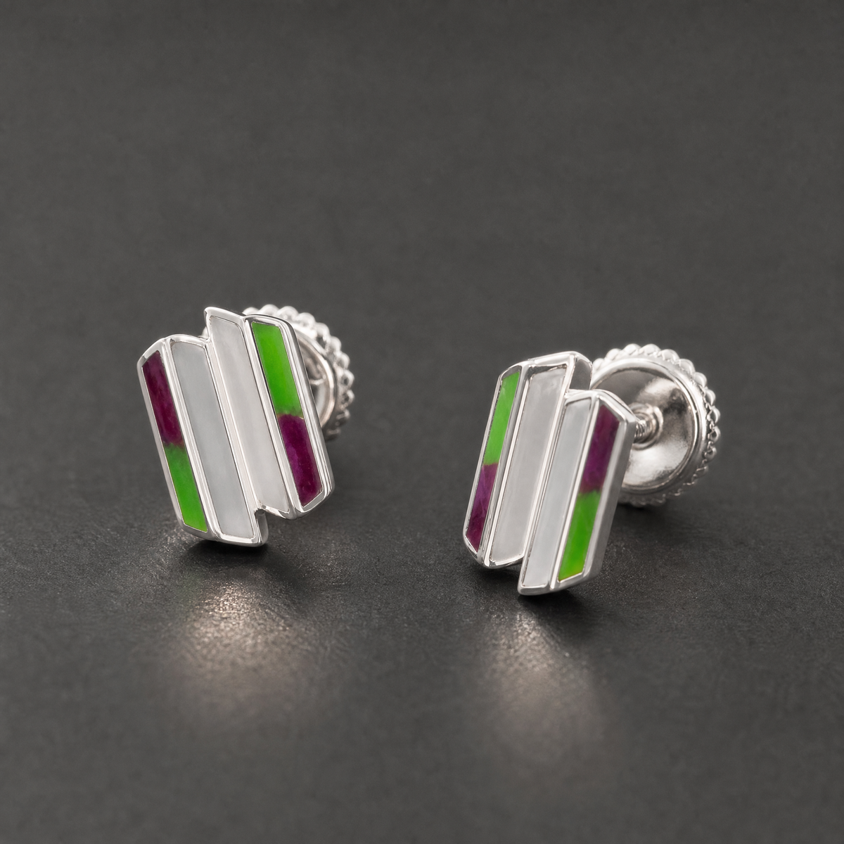 Offset Bar Enamel Stud Earrings in 925 sterling silver, angled view on a dark background