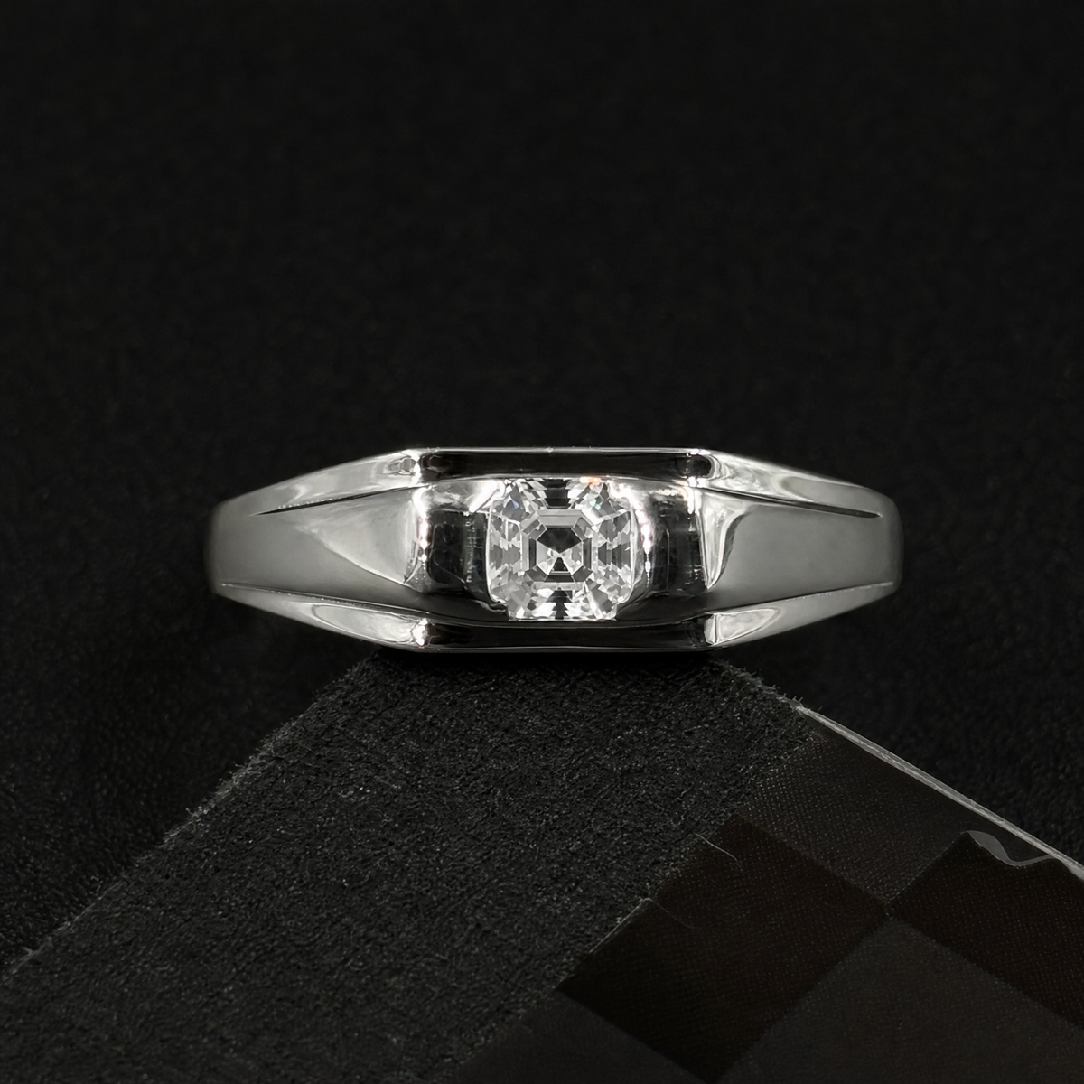Grooved Band Square Stone Ring in 925 sterling silver, on a dark background