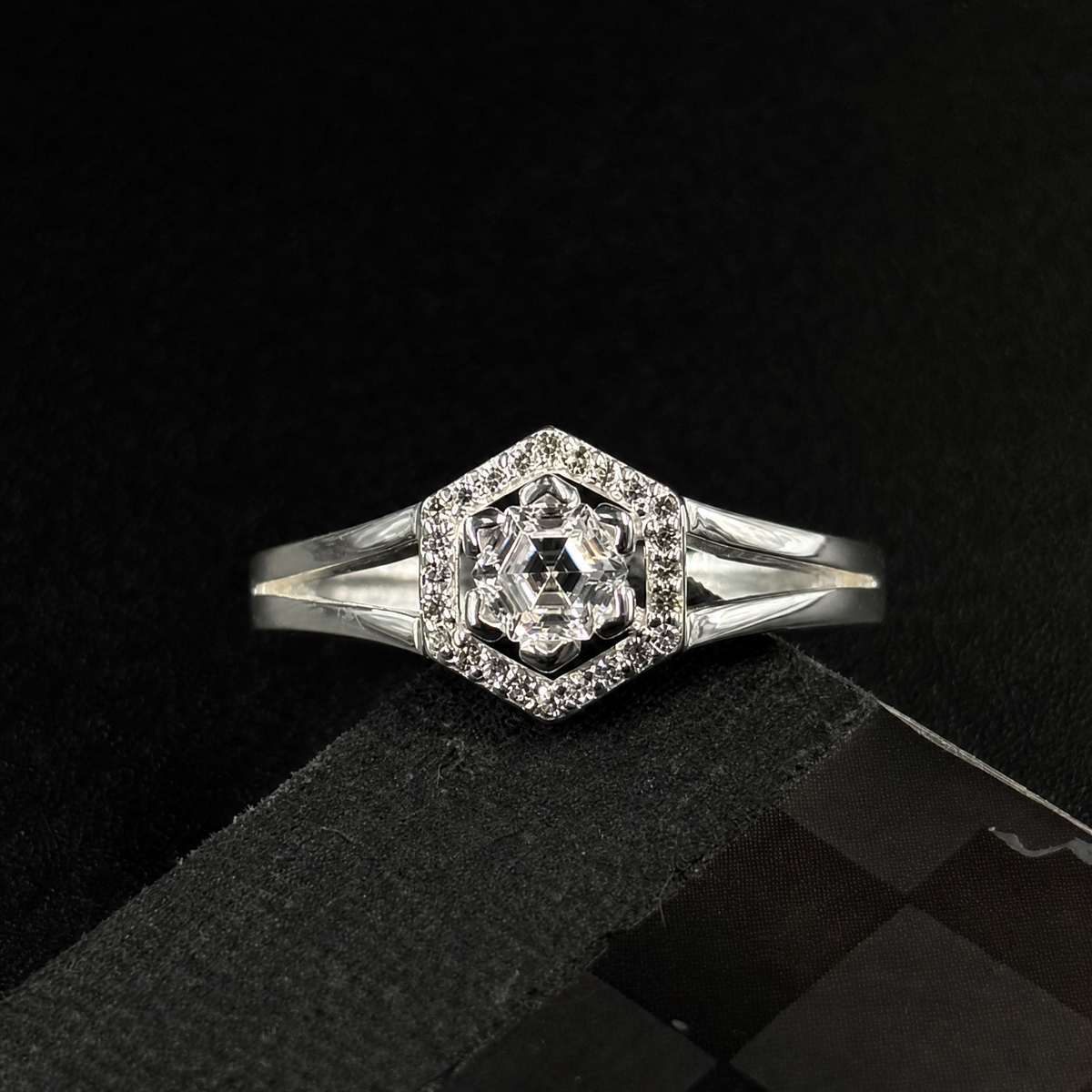 Hexagon Halo Split Band Ring in 925 sterling silver, on a dark background