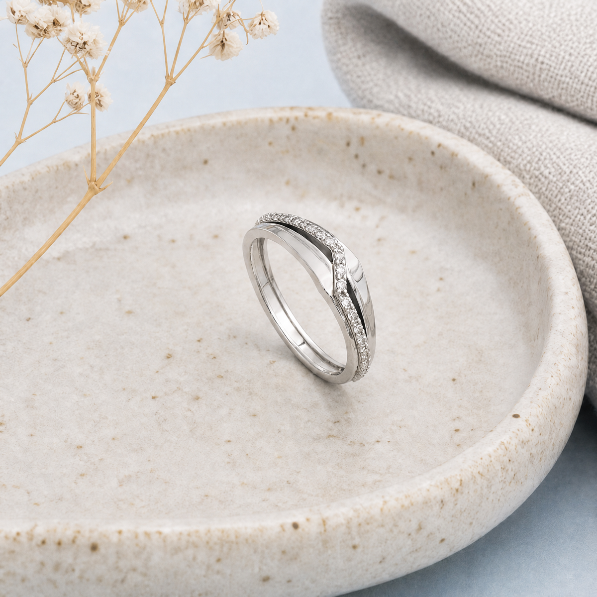 Chevron Pavé Double Band Ring in 925 sterling silver, in a ceramic dish