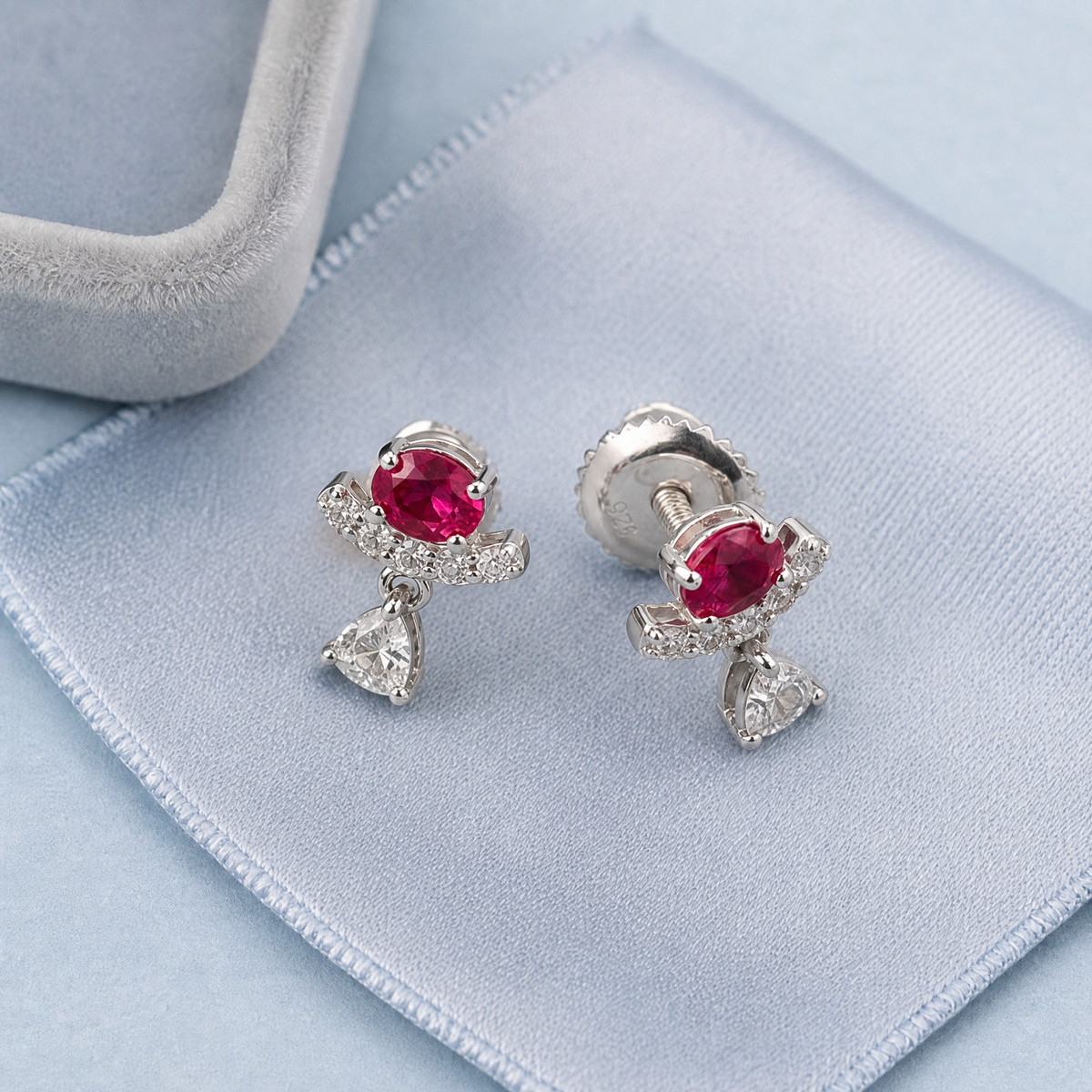 Pink Oval Bar Drop Earrings in 925 sterling silver, on a soft cloth